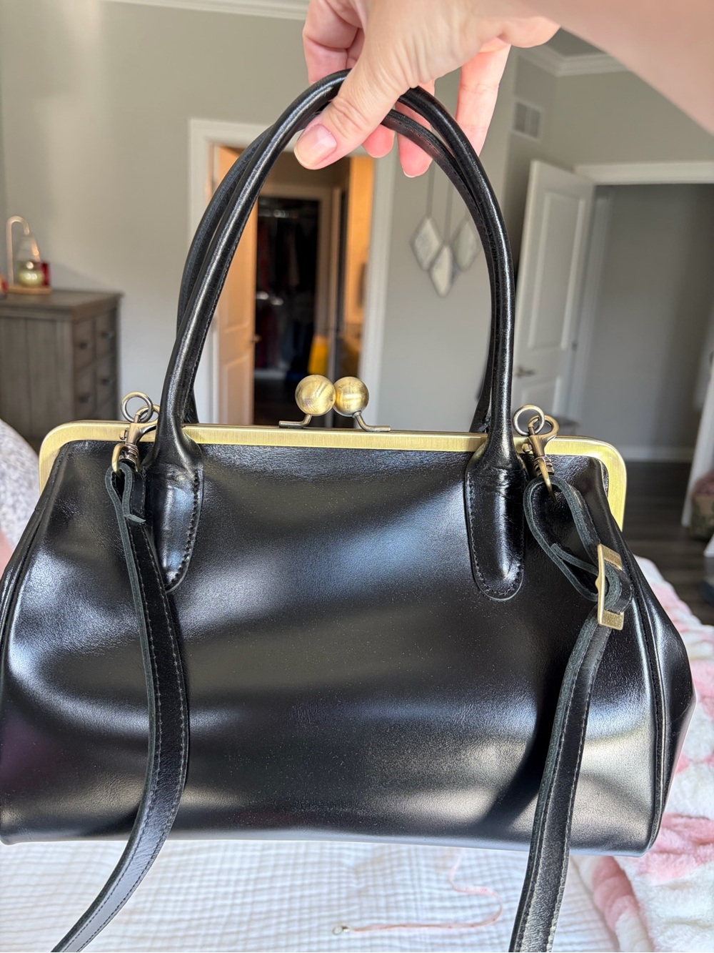 Taschenkinder purse 
Includes crossbody strap